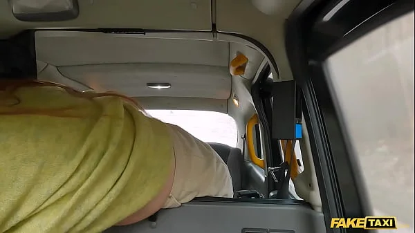 Fake Taxi Redhead MILF in sexy nylons rides a big fat dick in a taxi