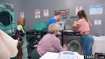 Young guy reverse gangbanged by hot MILFs in a laundry room