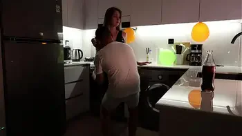I fucked my friend's mom in the kitchen after his birthday
