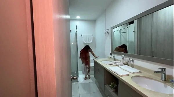 I find my step sister's red-haired friend in the bathroom and I can't resist looking at her huge tits.