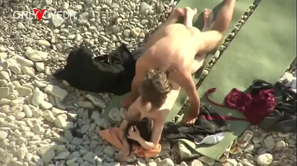 Beach Voyeur. Is fresh sperm good as a sunblock cream?