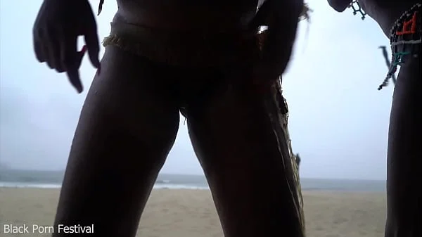 3 African tribe witches doing a dancing ritual for making rain