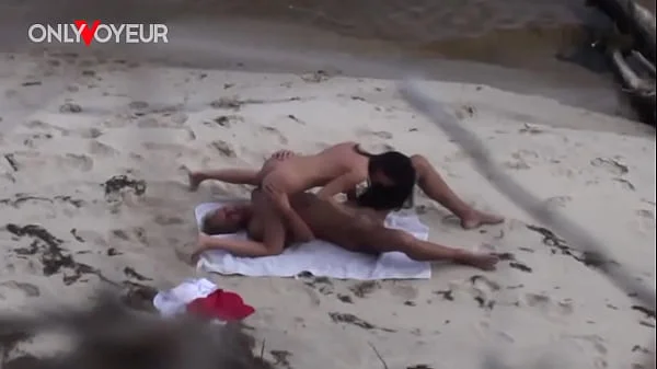 Beach Voyeur. Perfectly shaped teen having sex on a public beach