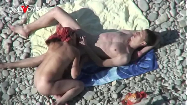 Beach Voyeur. Busty cougar MILF getting fucked by young guy