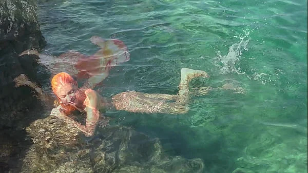 Blue water and a naked girl!