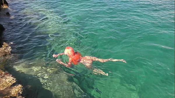 Blue water and a naked girl!