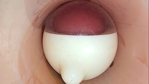 The camera in the deep pussy records a huge ejaculation of sperm into the condom