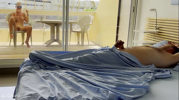 Naked wife was already watching nudists on street when husband woke in the morning