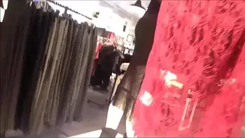 the store dressing room has a hidden video camera. What a shame!