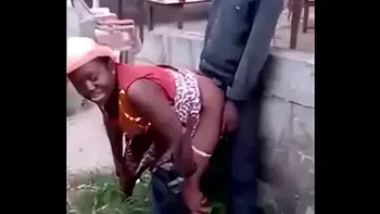 African woman fucks her man in public