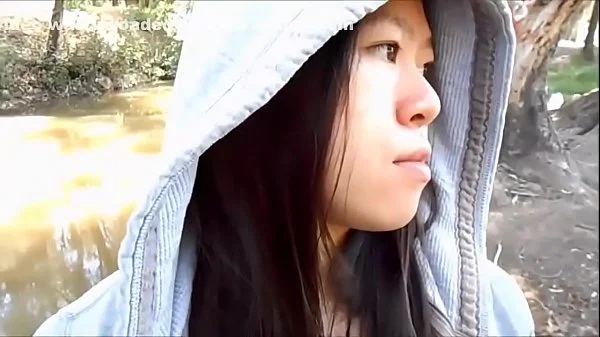 My cute asian girlfriend sucking me off in a public park and swallowing
