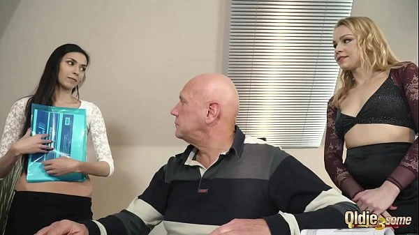 Old manager at the office fucks his two beautiful assistants right in his office he puts his cock inside their pussies fuck them hard and cums right in their mouths so he can watch them lick the cumshot and spit it