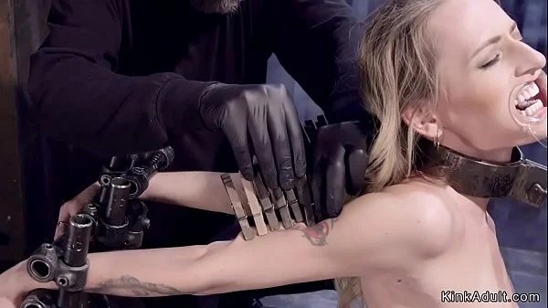 Shackled blonde tormented with stakes