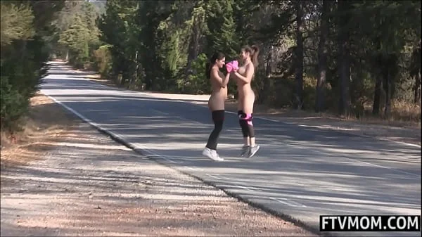 2 Milfs pissing in public