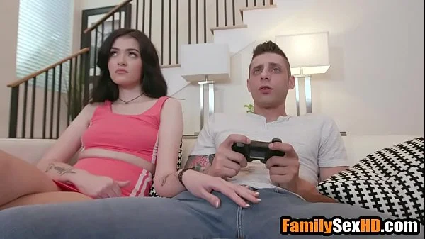 Bored stepsister fucks stepbrother while he plays on xbox