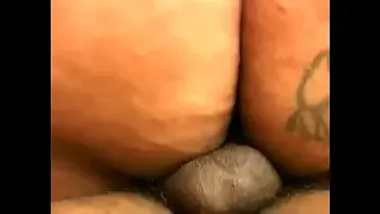 Chocolate cougar Vanilla with curly hair and massive garage enjoys getting her pussy wet with hard rod of black strapping fellow