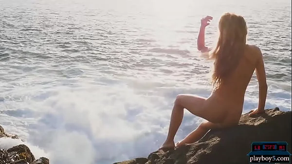 Two gorgeous MILF babes stripteasing and posing nude