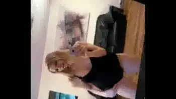 Naked in front of the mirror