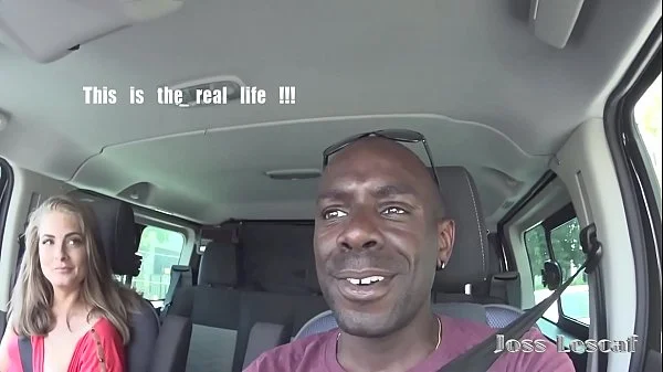 a young girl sucks a big black cock in a car park in the street in the middle of the afternoon.part1