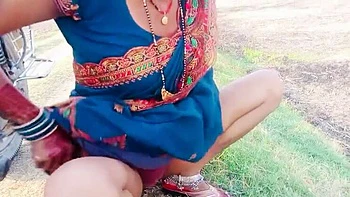 Desi Bhabhi RadhaDevi Pissing in Field Outdoor Hindi Webcam Masturbation