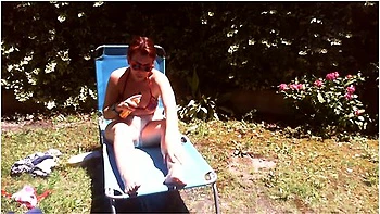 Nicoletta Sunbathes In A Public Garden Wearing A Big Dirty Diaper