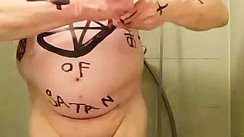 Satan slave takes an enema on Satan's orders