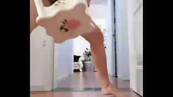 Chinese girl using chair legs as dildo