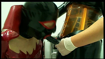 Humiliating pussy distress dildo sucking in masked, dominantrice in red latex dress