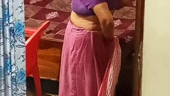 Aunty caught red handed on camera while changing dress.