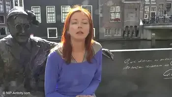 Pretty redhead walking naked in Amsterdam