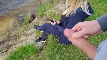 Jerk off a dick near a stranger girl in public