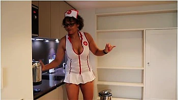 Nurse Comes To See Patient In His Room