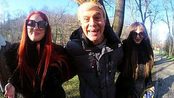 Two beautiful girls have an intense foursome with two guys in the open air