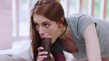 Skinny redhead takes a massive black cock in her shaved pussy