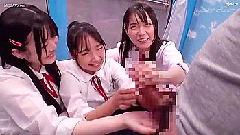 Three beautiful girls in uniform get excited when they see a man's penis and cum all over his hands.