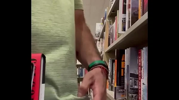 Jerking off at the bookstore. Public masturbation