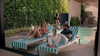 Two sexy babes share a big cock in a steamy threesome