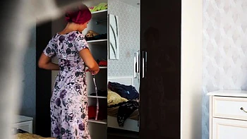 Watch this teen undress and try clothes