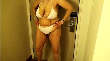 Tinja, a Busty Amateur Mature in a Tiny Bikini
