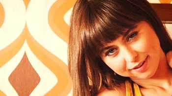 Petite pornstar MILF flaunts perky boobs