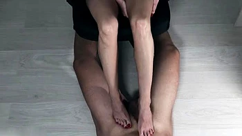 Light femdom and foot fetish play with brunette