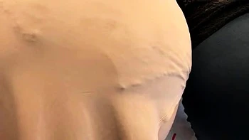 Brunette seductress working her big boobs and hot ass