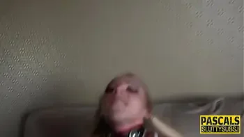 Bound slut gagging on cock