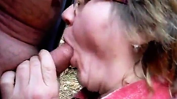 Granny Gives Blowjob to Her Husband Outdoors