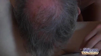 Cleaning Woman Surprises An Elder Guest Taking A Bathtub In A Hotelroom