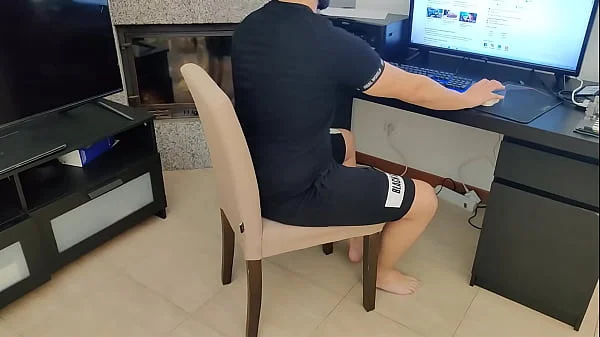 mature gives her stepson a handjob while watching porn