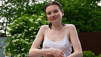 A sexy short solo with Milka Wey by the pool