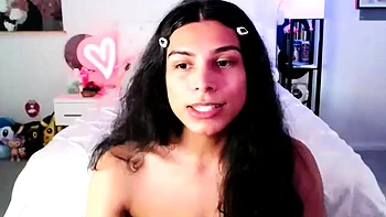 Small titted brunette Sharron with glasses masturbates