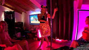 Two lesbian strippers have fun on the floor, showing their nice ass