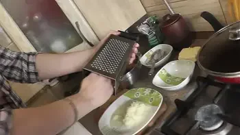 In stockings in high heels no panties and bra sexy MILF Frina continues her nude cooking. Hot and cold minced meat roll on the menu today